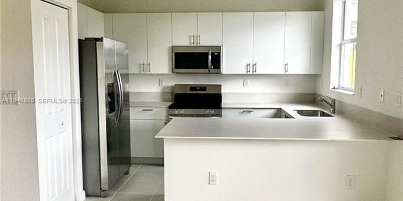 Homestead Townhome: 2713 SE 26th Rd