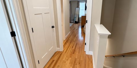 Bright, decluttered staircase and hallway-10.png