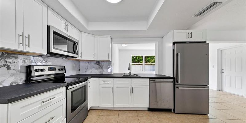 Sunrise House: 7490 NW 23rd St