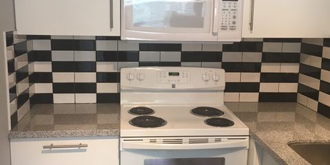 2BR Kitchen Range and MW.jpg