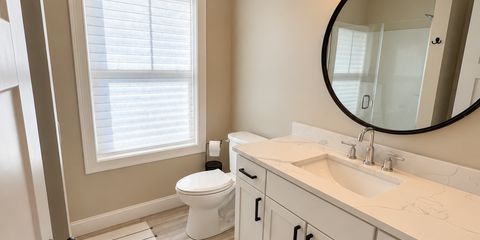 Bright, decluttered bathroom listing photo-2.png