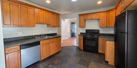 Modern Kitchen with Black Appliances.png