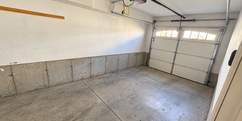 Clean, empty garage in original condition.png