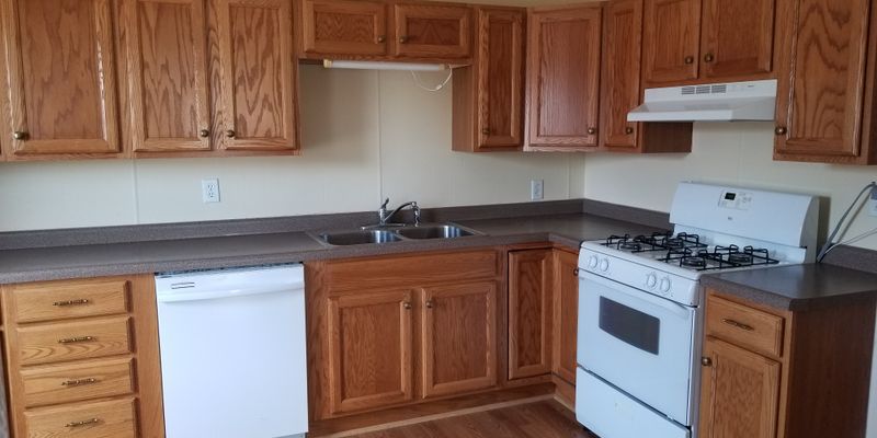 Grand Meadow Apartment: 104 Main St S